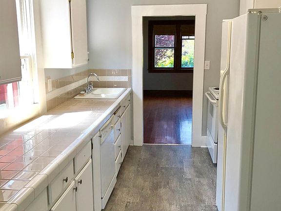 Kitchen looking to living room