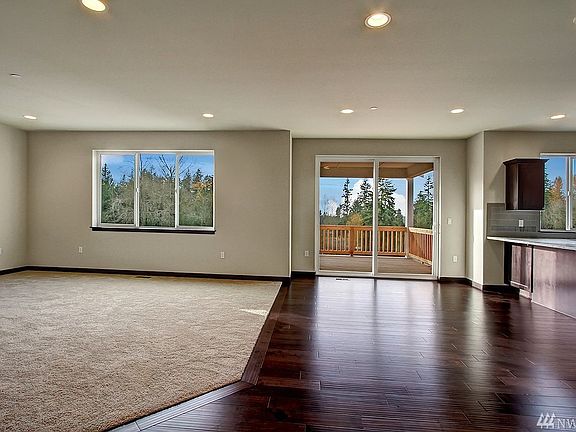 Stainless appliances, soft close drawers, abundance of cabinets & quartz countertops to delight in this open concept kitchen. 