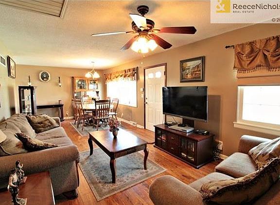 Open floor plan with hardwood floors.