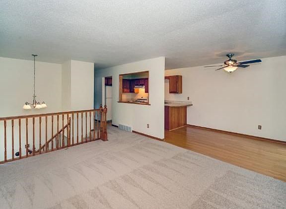 Large living room open to the dining room and kitchen.