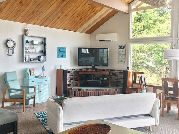 View from the kitchen. Yes, that_s a hand carved Indonesian canoe hanging from the ceiling.