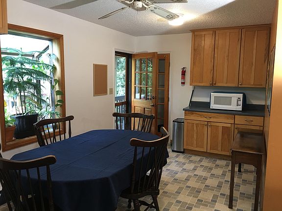 Another view of the kitchen, which has a greenhouse window for plants.