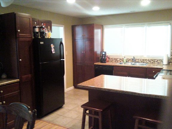 eating bar in kitchen and large pantry