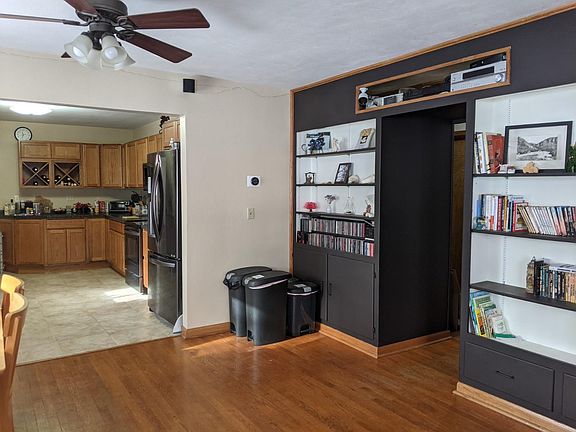 Dining/living room, entrance to back hall and storage.