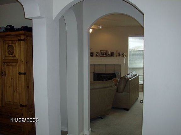 Entry hall looking into living room