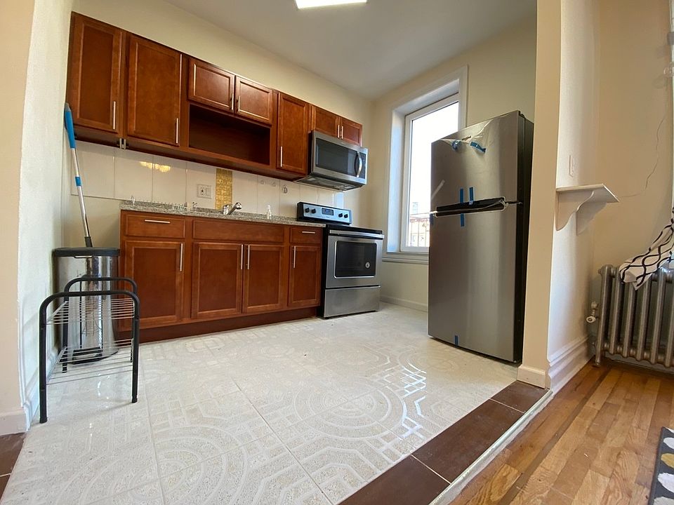 2nd image of 61-12 Woodbine St #4B