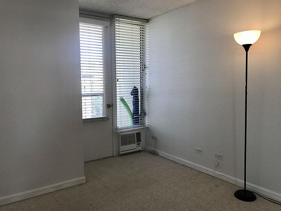 AC in bedroom, small lanai off bedroom