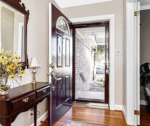Enter into the foyer and fall in love with the bamboo wood floors throughout the entire house.