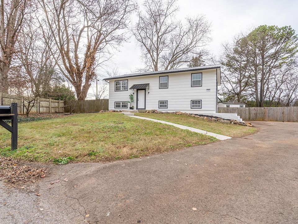 Long driveway with 1 designated parking spot. Additional first come first serve spot on driveway and street parking available.