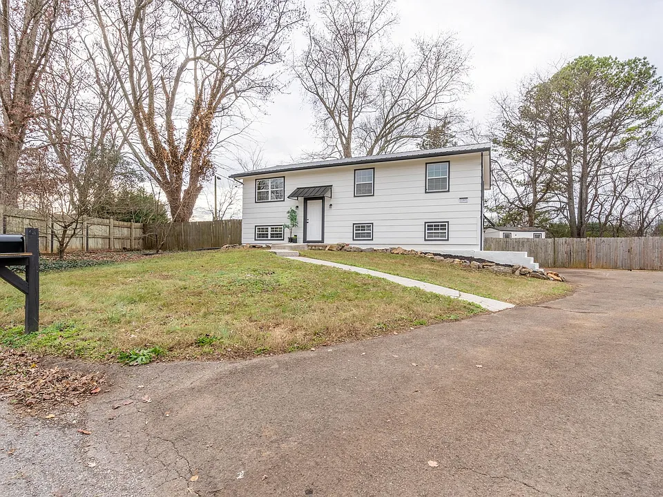 Long driveway with 1 designated parking spot. Additional first come first serve spot on driveway and street parking available.