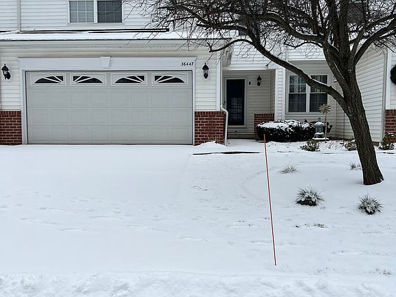 Front view with 2-car, heated, attached garage.