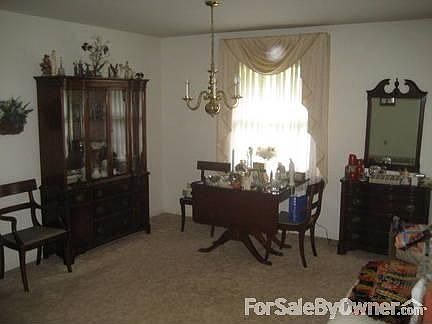 Dining Room
						:
						Solid wall for breakfront or hutch + large table.