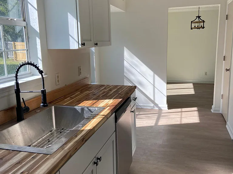 Kitchen with eat in area as well as dinning area off of living room.