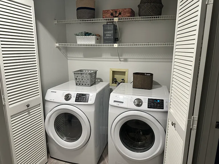 Washer and dryer in unit.