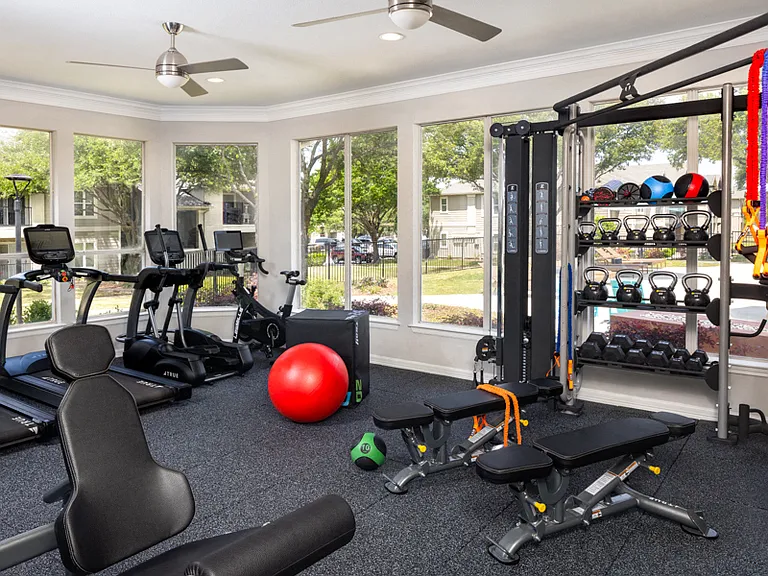 Fitness center with cardio, weight, and resistance machines