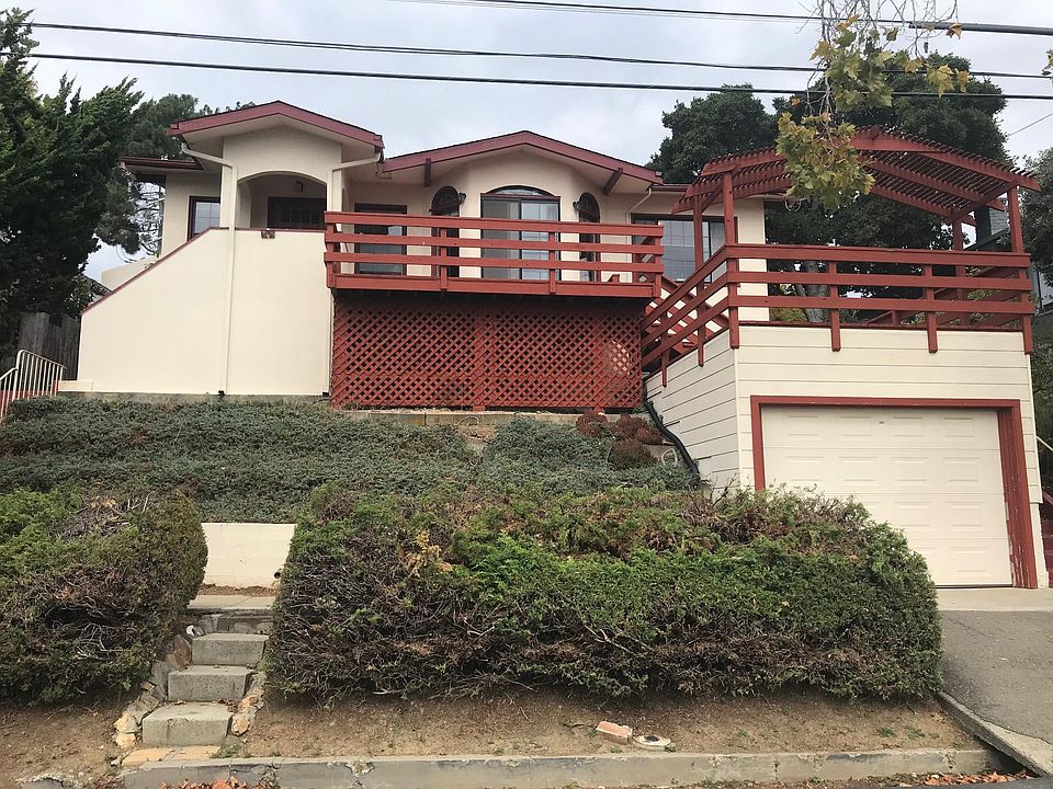 Street view: garage, house, deck