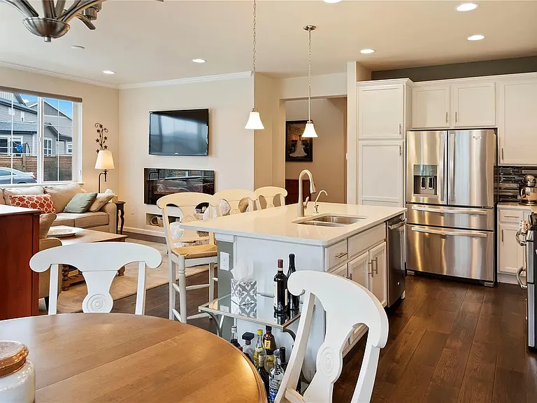 Open-concept kitchen, dining, and living space