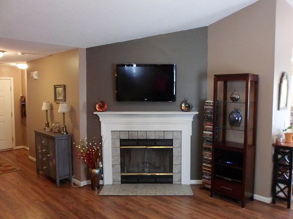 Fireplace with mounted TV