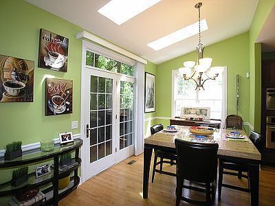 Breakfast room w/skylights, volume ceiling & SGD to amazing backyard
