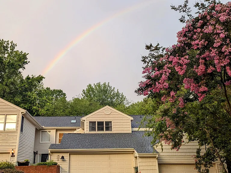 Rainbow over the driveway and front of unit