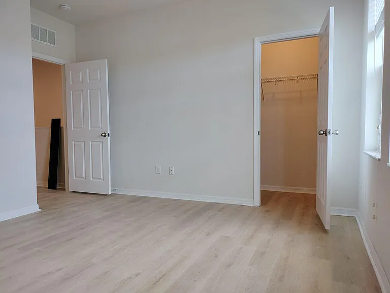 Master bedroom with walk in closet