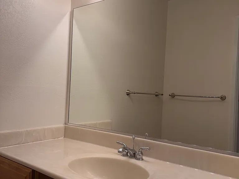 Sink adjacent to master bedroom