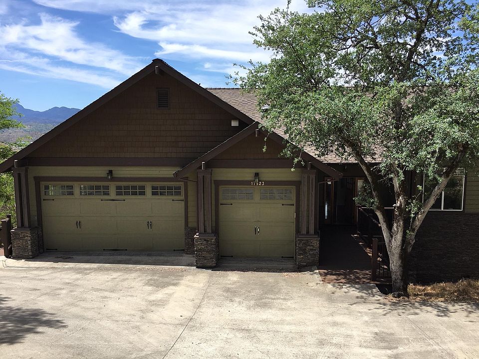 Downslope entrance to house either through two doors through