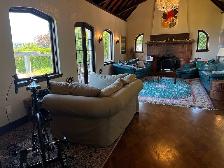 living room with stationary bike set-up