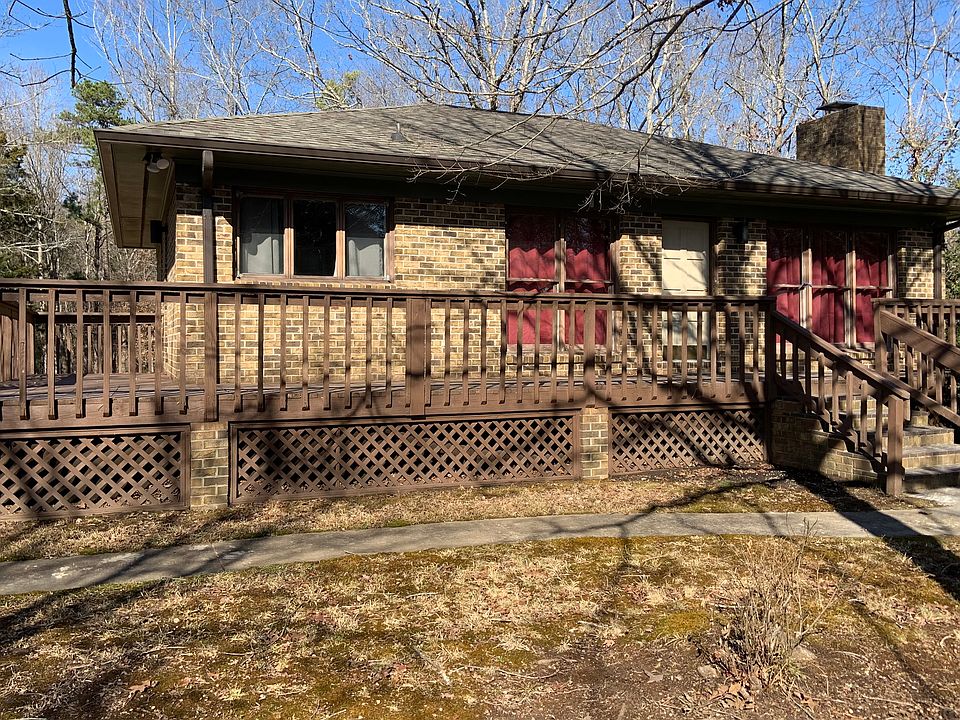 Full Brick Single-Level Ranch Style Home with large deck area.
