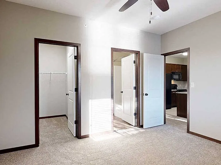 Our Fir Villa features a large walk-in closet and en suite bathroom in the bedroom.
