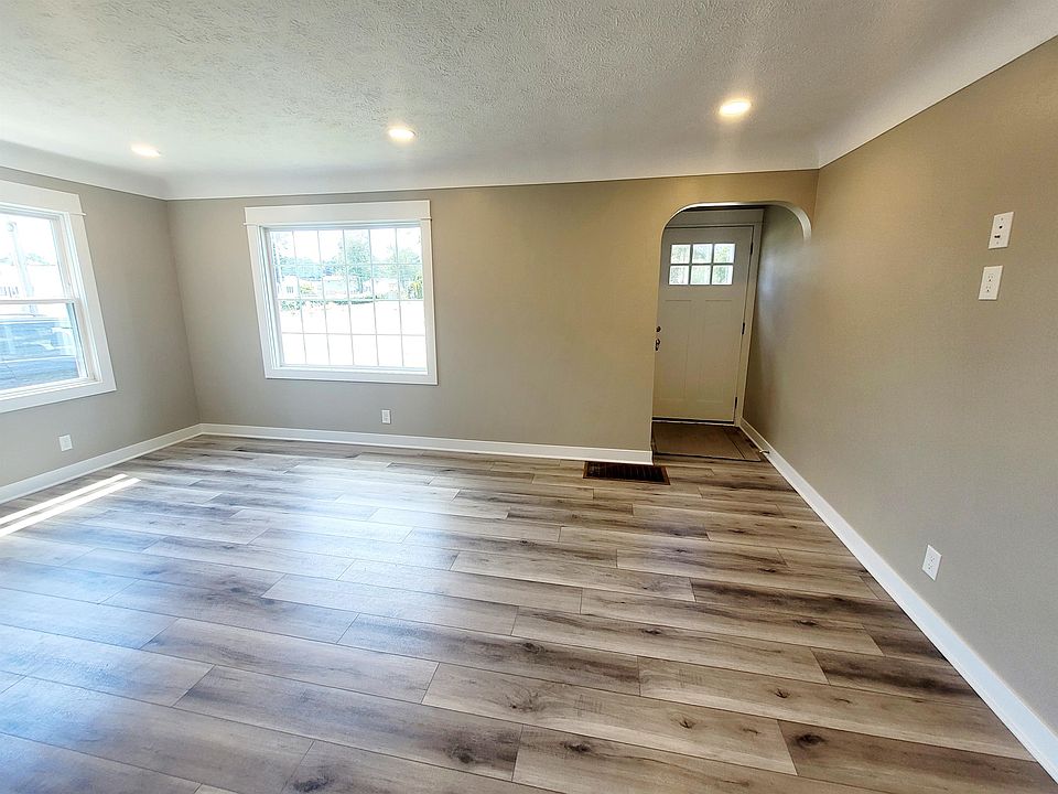 Living room with front entry