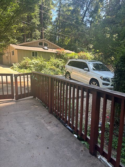Front deck. Parking area