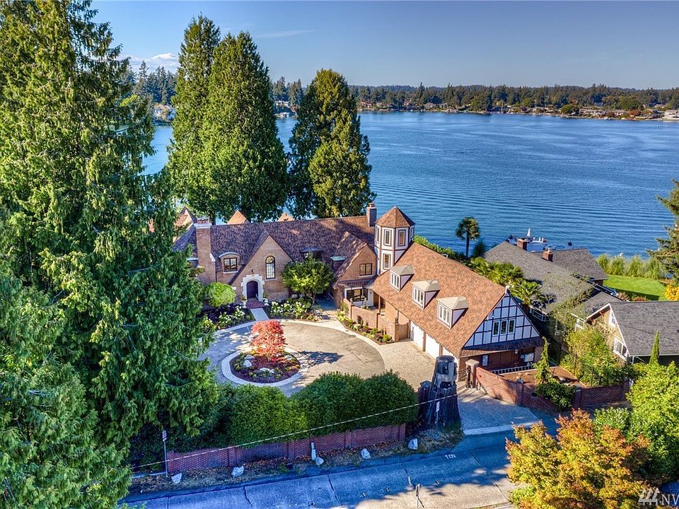 This is a once in a lifetime opportunity to own a very special move-in ready Lake Steilacoom waterfront estate. 