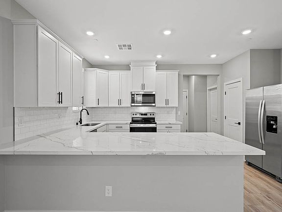 Enjoy a quick meal at the spacious breakfast bar.