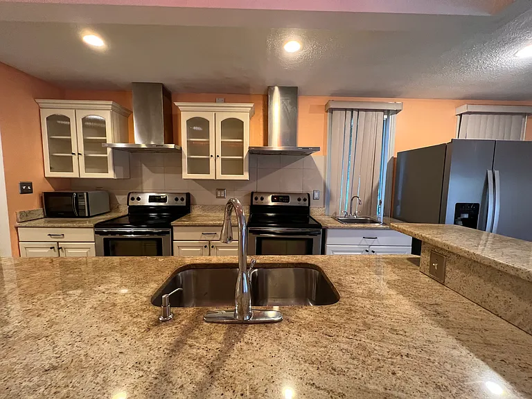 kitchen view with double stoves