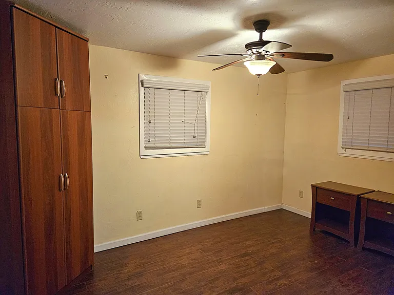 Bedroom, night stands belong to owner, can either stay or be removed. Close stays.