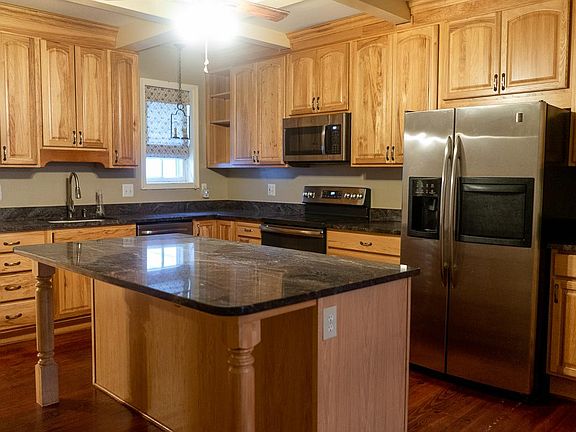 Completely updated kitchen, including granite counter tops, room for barstools for eat-in area, stainless steel appliances and lots of storage.