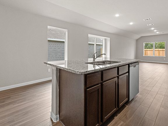 Kitchen to Dining Area and Family Room