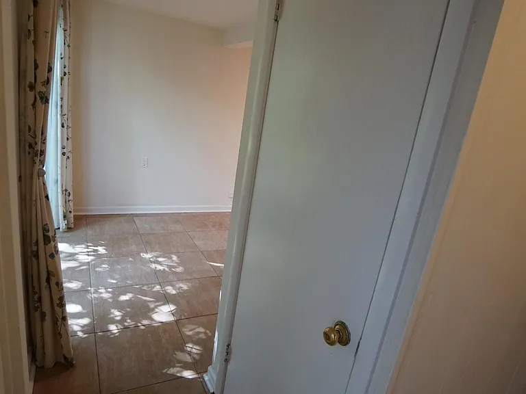 Door to basement from first floor near kitchen