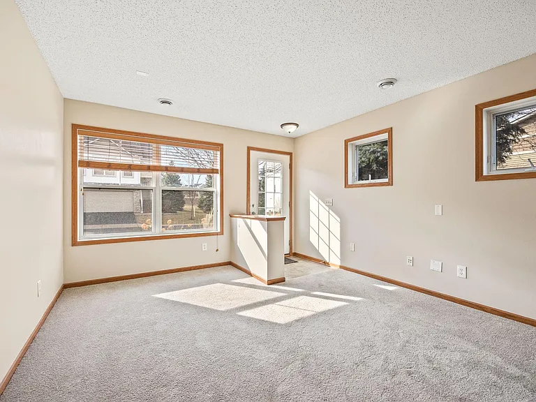 View from Inside, Entrance door and Living room. Lot of windows and natural light.