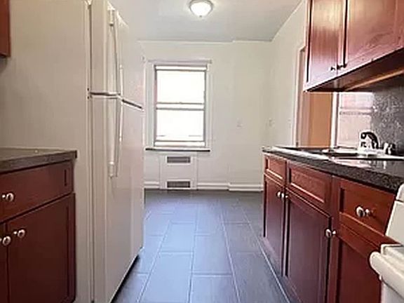 5th image of 65-20 Booth St #3H