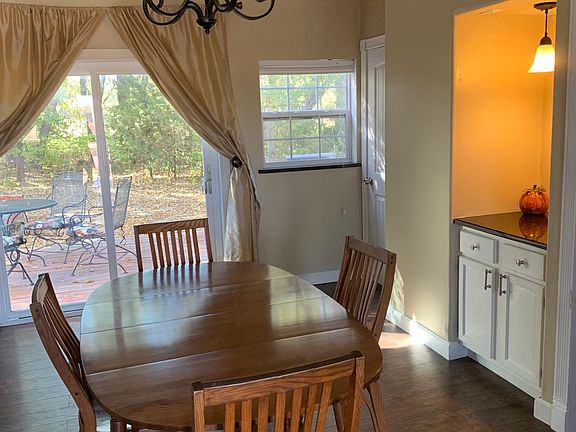 Spacious dinning overlooking the back deck.