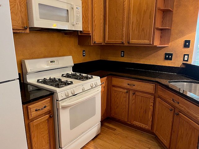 Kitchen. Also has extra countertop space to the right of sink not shown on photo.