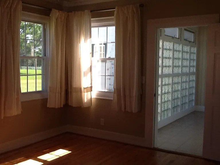 First floor bedroom leading into hall