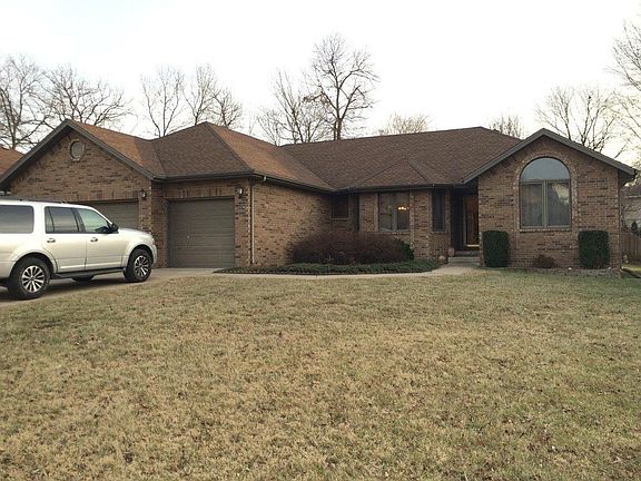 Brick Exterior with 3 car garage
