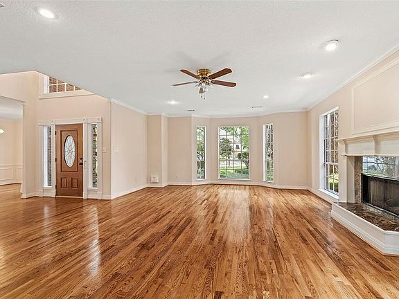 Beautiful wood floors run throughout the first floor