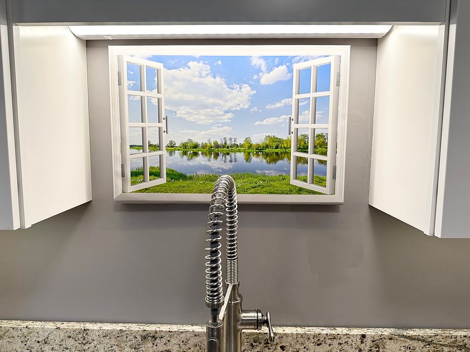 Kitchen faucet with picture of pond