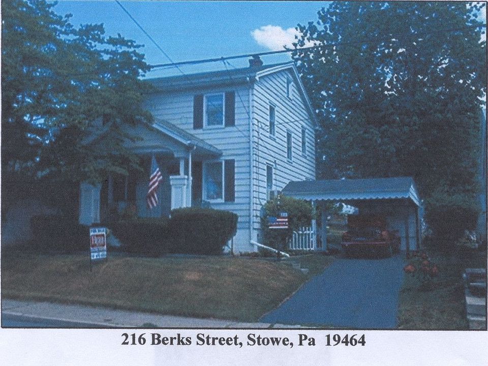 Front of House with beautiful dogwood