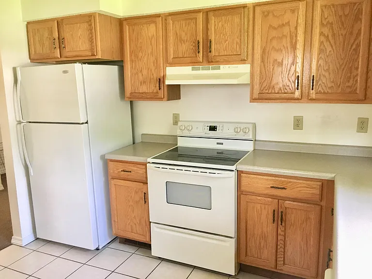 Kitchen with refrigerator, stove and dishwasher