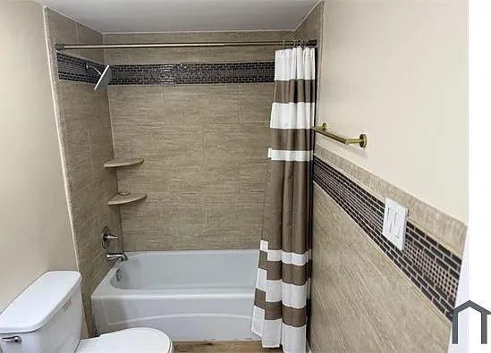 1017 E 194th St #104 — Photo 5